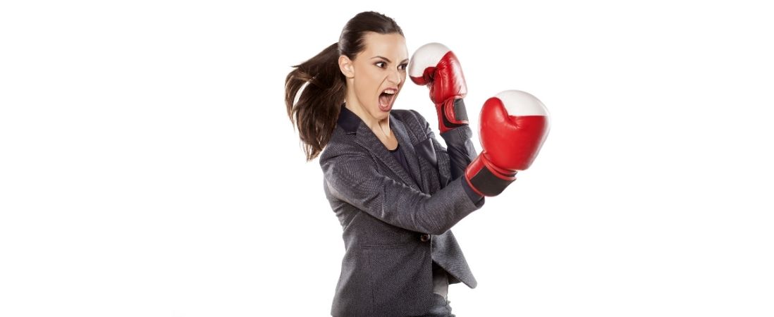 woman in leadership ready to fight wearing gloves